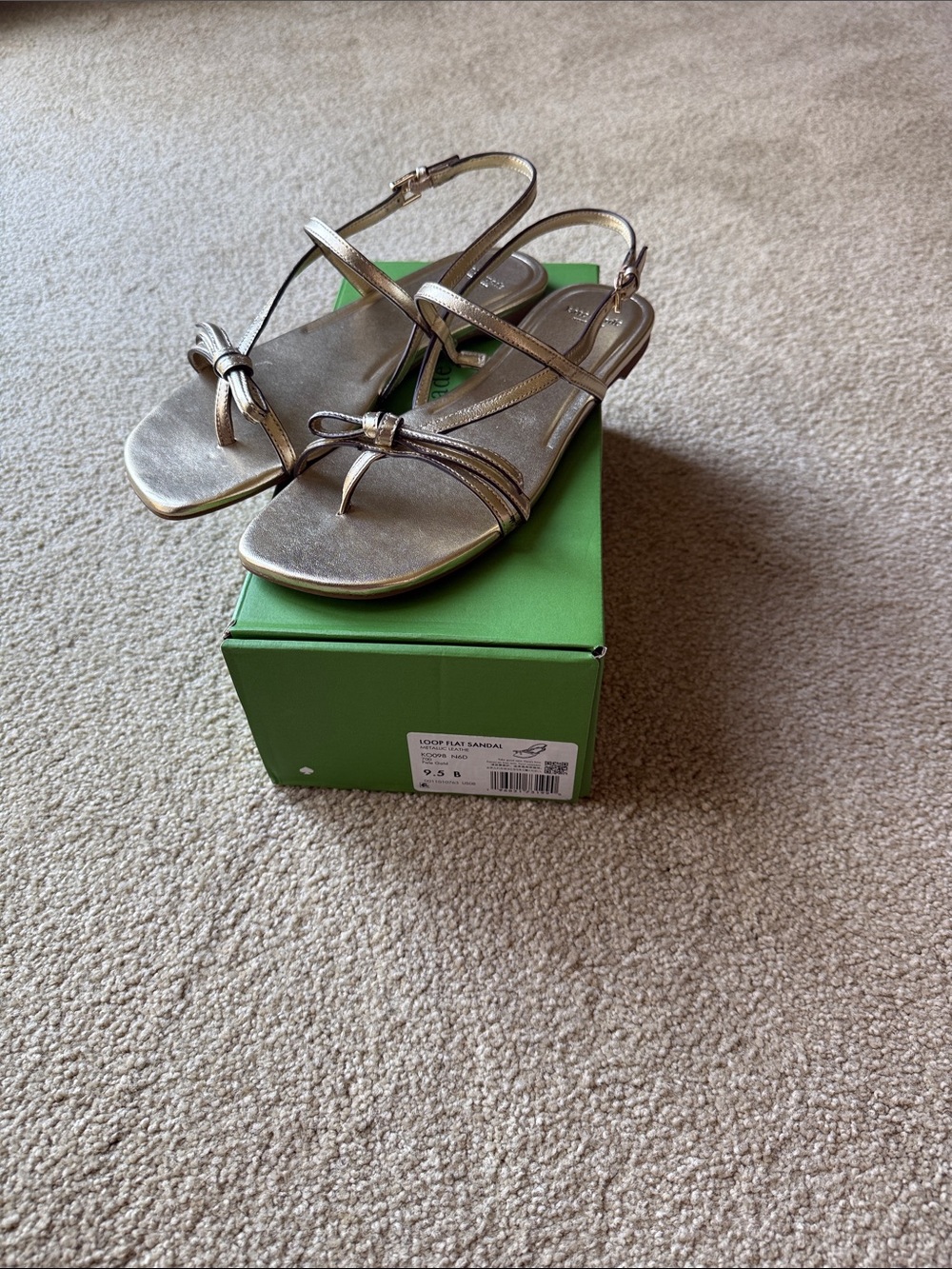 New in box kate spade size 9.5 Loop flat sandal in metallic pale gold